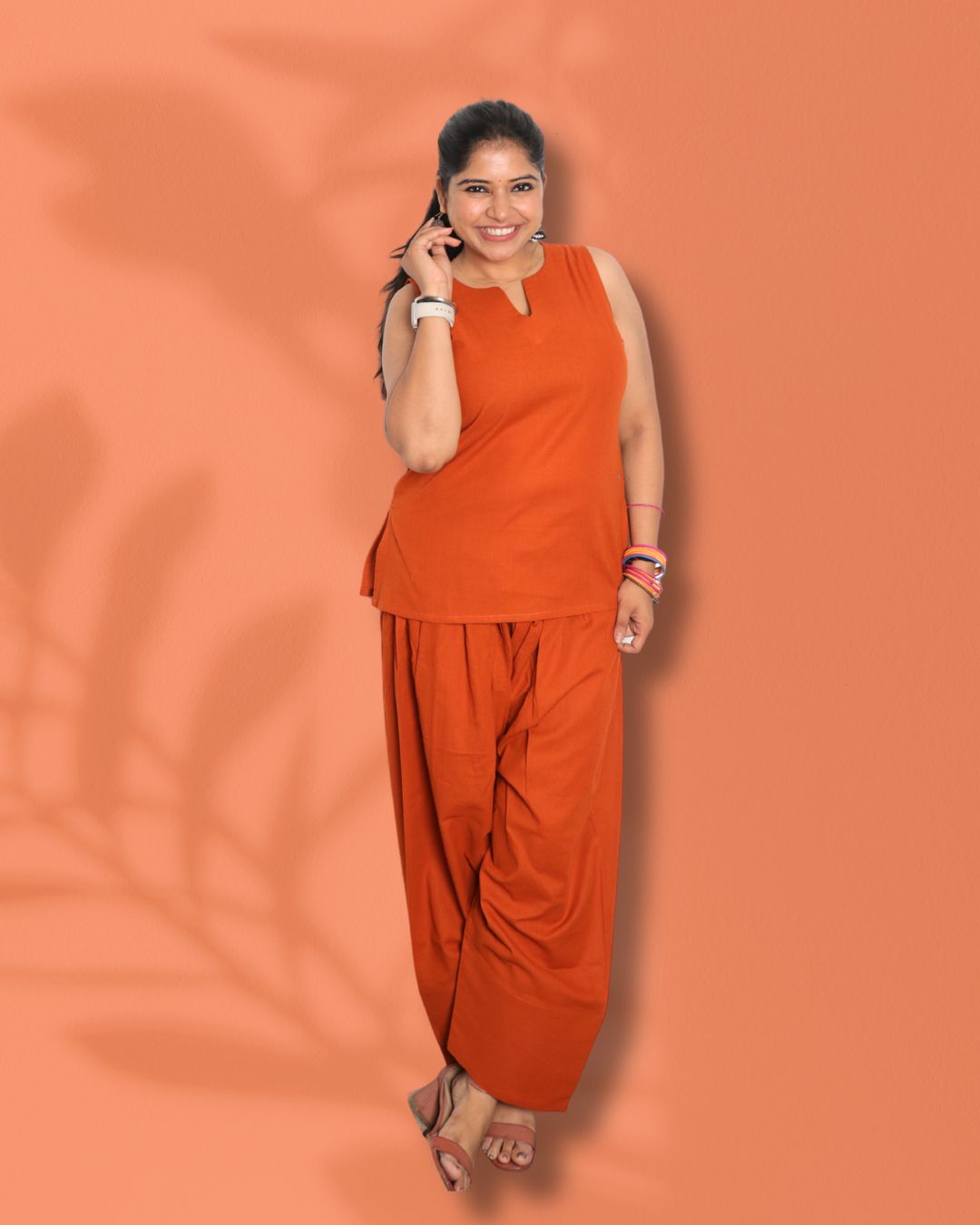 Solid Orange Sleeveless Kurti  Pharsi Pant Set