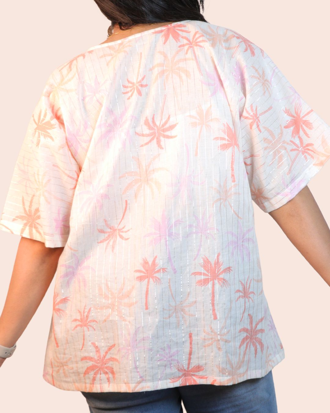 Palm White A-line floral tunic with a relaxed, breezy fit