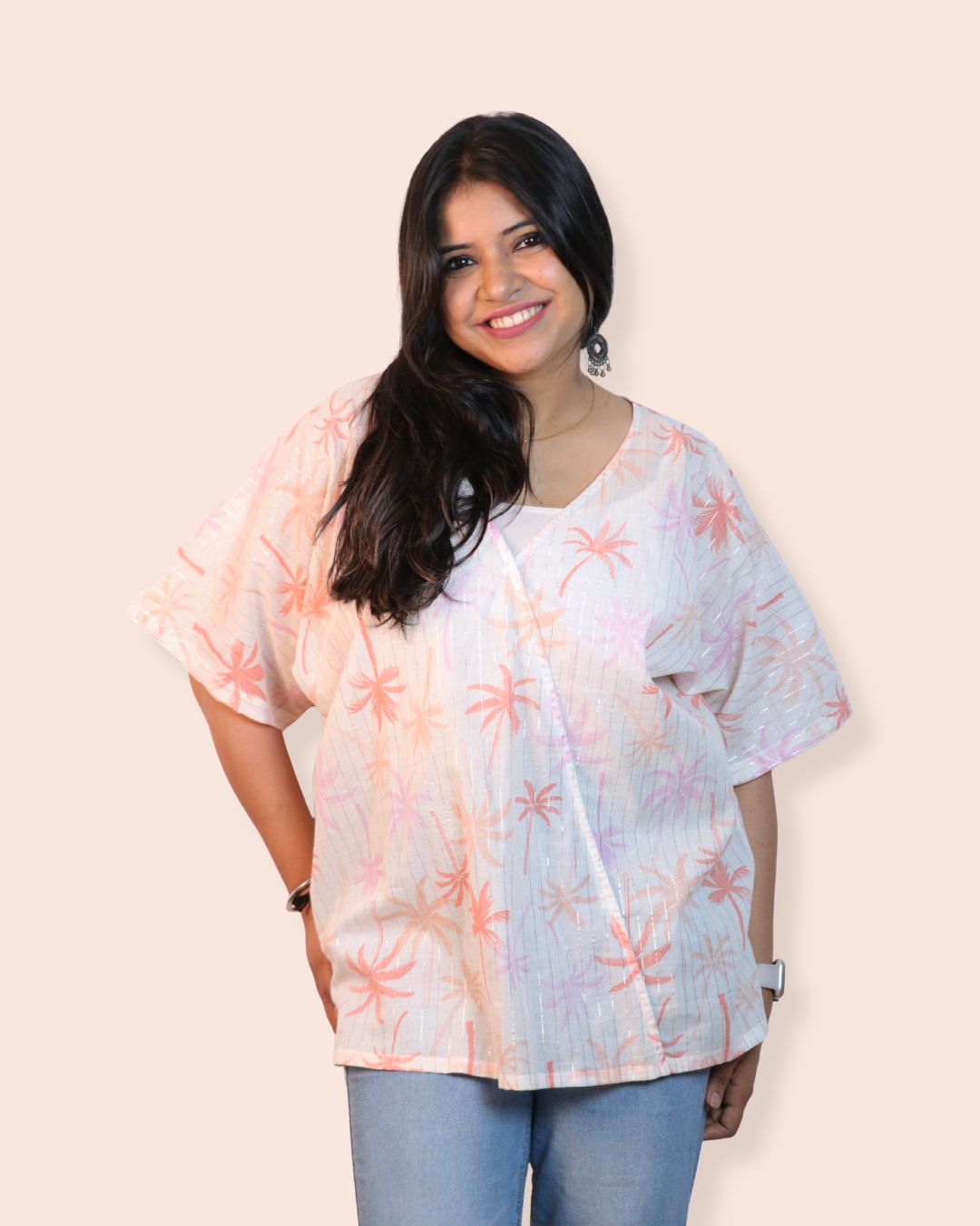 Palm White A-line floral tunic with a relaxed, breezy fit