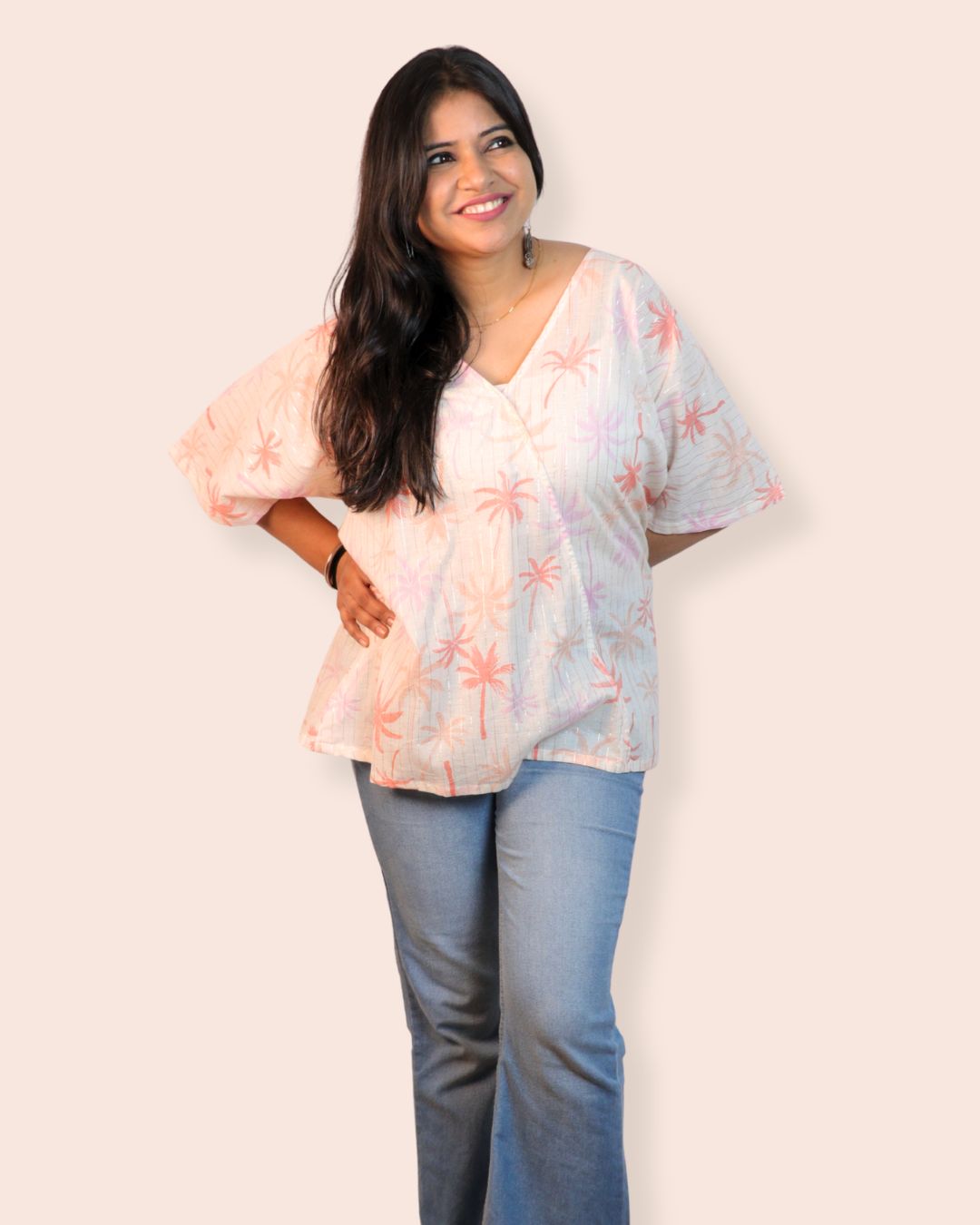 Palm White A-line floral tunic with a relaxed, breezy fit