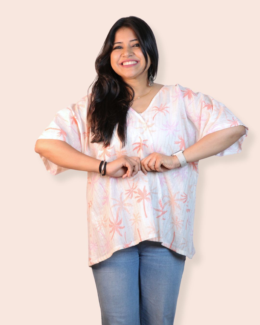 Palm White A-line floral tunic with a relaxed, breezy fit