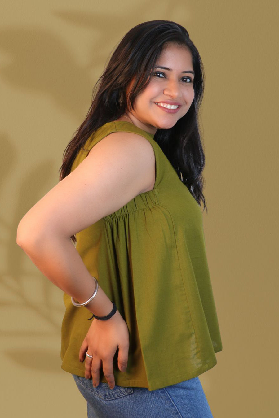 Maavish Olive Green Sleeveless Top with Side Smocking & Flared Hem