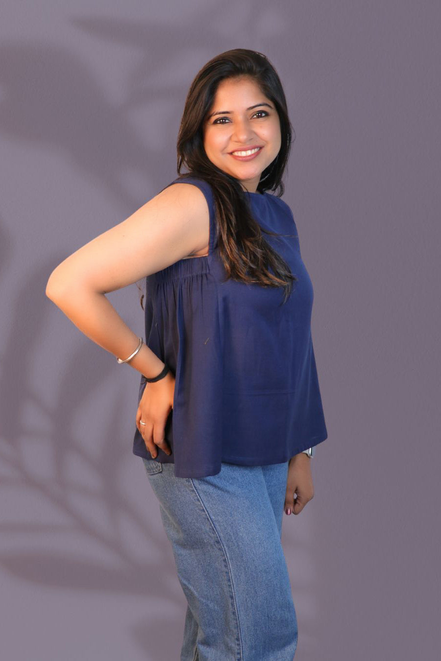 Maavish Blue Sleeveless Top with Side Smocking & Flared Hem