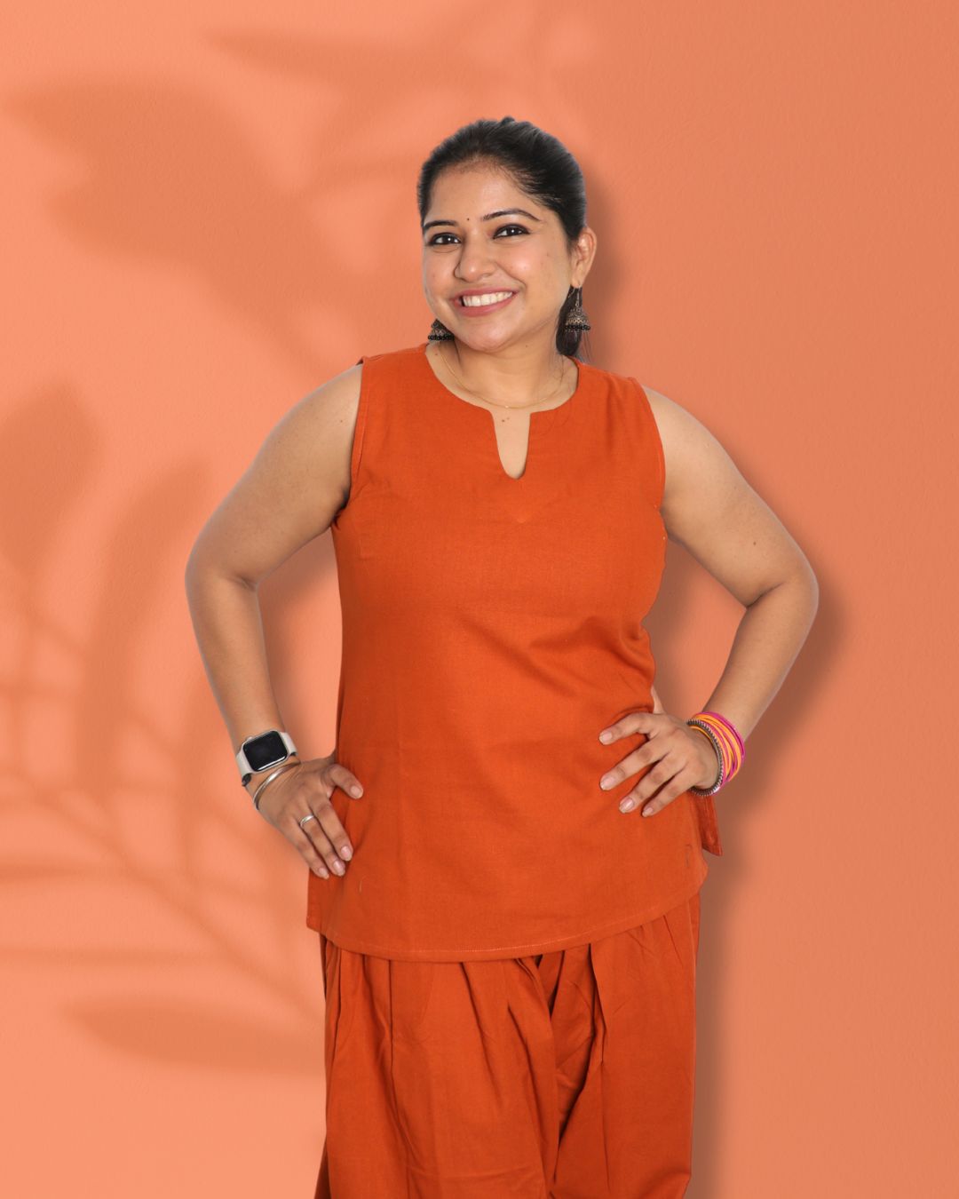 Solid Orange Sleeveless Kurti  Pharsi Pant Set