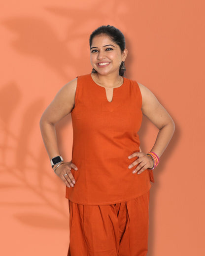 Solid Orange Sleeveless Kurti  Pharsi Pant Set