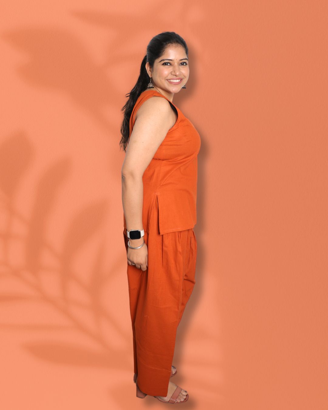Solid Orange Sleeveless Kurti  Pharsi Pant Set